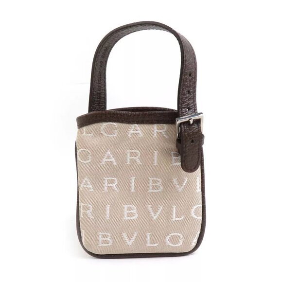 Ivory poodle fur bag with an épine label